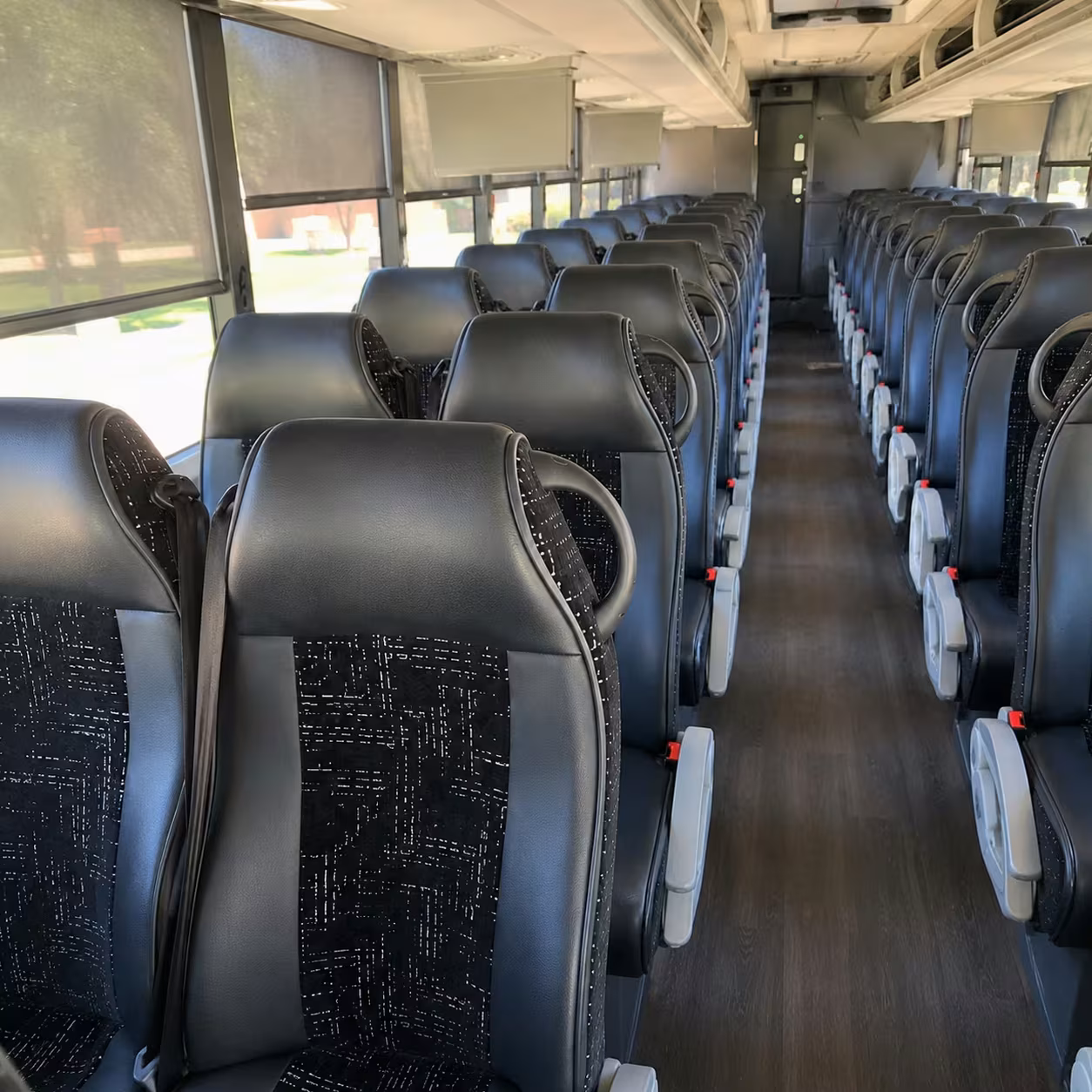 corporate campus charter bus rentals across the longview metro